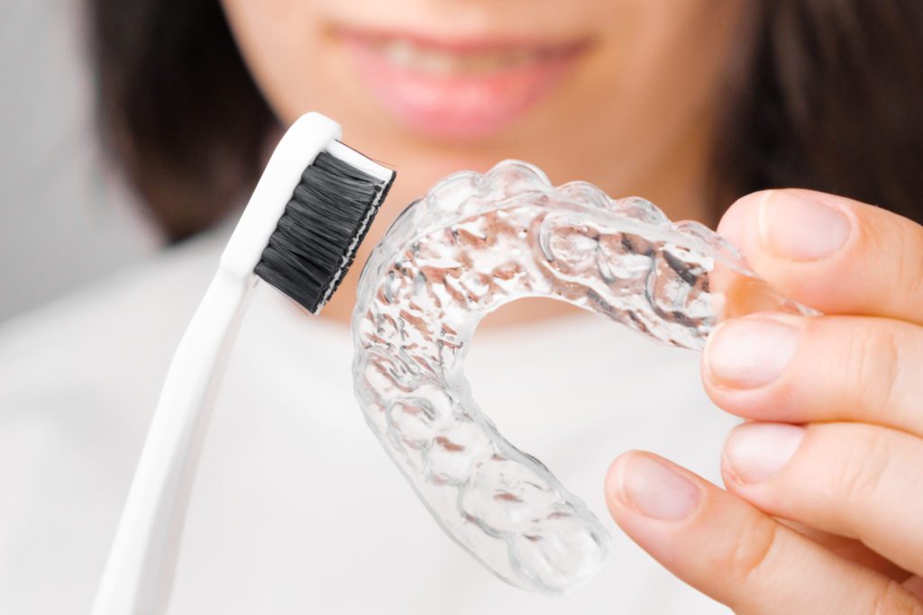 The Dos and Don'ts of Eating with Invisalign Aligners Sloan Dental